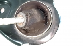 The lower front left control arm of a Kia Sportage 23-26 USA has a torn silent block.