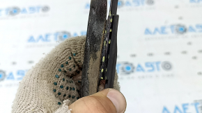 The lower foot-operated trunk opening sensor mount for the Audi A5 F5 20-25 is cracked.