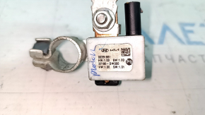 Negative terminal of the Kia Sportage 23-26 2.5 battery with a sensor