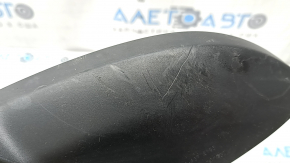 The lower trim of the left side mirror of the Audi A5 F5 18-25 5D has broken fasteners and scratches.