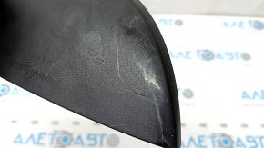 The lower trim of the left side mirror of the Audi A5 F5 18-25 5D has broken fasteners and scratches.