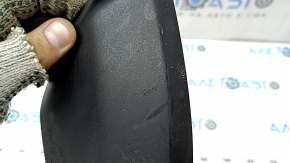 The lower trim of the left side mirror of the Audi A5 F5 18-25 5D has broken fasteners and scratches.