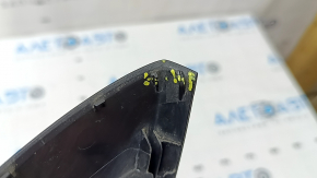 The lower trim of the left side mirror of the Audi A5 F5 18-25 5D has broken fasteners and scratches.
