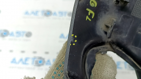 The lower trim of the left side mirror of the Audi A5 F5 18-25 5D has broken fasteners and scratches.