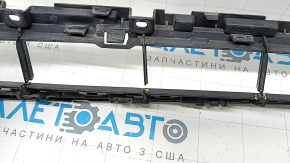 The lower grille of the front bumper of the Audi A5 F5 20-25 is broken, cracked