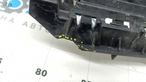 The lower grille of the front bumper of the Audi A5 F5 20-25 is broken, cracked