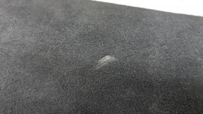 The trunk floor of the Audi A5 F5 19-25 5D is black and dented.