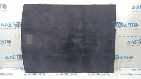 The trunk floor of the Audi A5 F5 19-25 5D is black and dented.