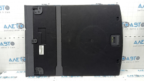 The trunk floor of the Audi A5 F5 19-25 5D is black and dented.