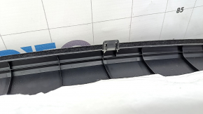 The trunk tray of the Hyundai Santa Fe 24-26 is cracked, the lid is dented.