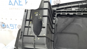 The trunk tray of the Hyundai Santa Fe 24-26 is cracked, the lid is dented.