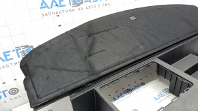 The trunk tray of the Hyundai Santa Fe 24-26 is cracked, the lid is dented.
