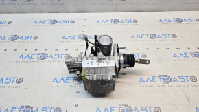 The ABS assembly with the brake master cylinder of a Toyota Prius V 12-14 is leaking air.