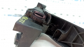 The gas pedal cap on a Kia Sportage 23-25 is dented.