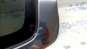 Mitsubishi Outlander 22-26 rear left window, tinted with chrome molding, scratches on molding, dented molding