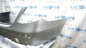 Bare rear bumper for Mercedes W213 E 17-20 with parking sensors, without moldings, AMG pack, silver, cracks, scratches, broken fasteners, BSM fastener came off