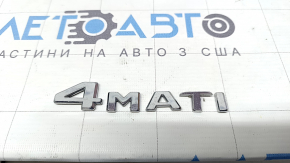 The 4MATIC emblem on the trunk lid of the Mercedes W213 E 17-23 is missing the letter C.