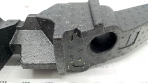 The front bumper absorber of the Subaru Forester 25-26 is dented.