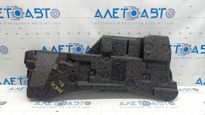 The left trunk foam of a Subaru Forester 25-26 is dented.