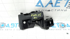 The left rear bumper mount for a Subaru Forester 25-26 is broken.
