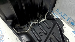 Subaru Forester 25-26 front left fender liner torn