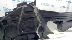 Subaru Forester 25-26 front left fender liner torn