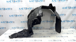 Subaru Forester 25-26 front right fender liner torn