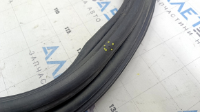 The rubber seal on the tailgate of a Ford Edge 15-18 is worn out.