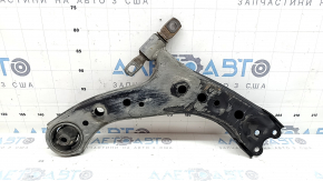 The lower front left control arm of a Toyota Highlander 20-26 is torn.