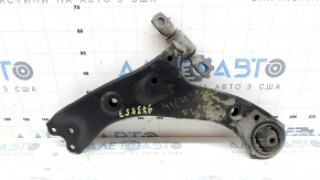 The lower front left control arm of a Toyota Highlander 20-26 is torn.