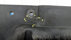 The rear engine guard of the Mercedes W213 E 17-23 AWD is cracked, worn, and missing a fragment.