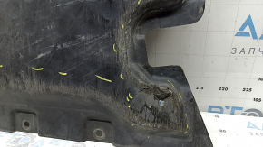 The front engine guard for a Mercedes W213 E 17-23 AWD is cracked and worn, with no fragments.
