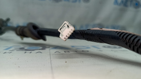 The rear left ABS sensor wire on a Lexus UX 19-26 has a broken connector.