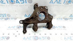 The rear left axle of a Lexus UX 19-26 AWD is rusty.