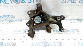 The rear left axle of a Lexus UX 19-26 AWD is rusty.