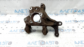 The rear right axle of a Lexus UX 19-26 AWD is rusty.