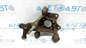 The rear right axle of a Lexus UX 19-26 AWD is rusty.