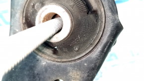 The lower front right control arm of a Lexus UX 19-26 is rusty, with microcracks.