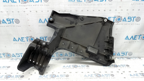 The rear left underbody protection of a Toyota Camry v70 18-24 hybrid is dented.
