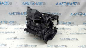 The bare heater housing of a Toyota Camry v70 18-22 hybrid air conditioner without rear row air conditioning, without radiators and actuators.