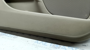 Beige front left door panel for a Lincoln MKZ 17-20, with beige leather insert, beige leather armrest, gray molding, brown upper part, with handle, dry-cleanable, scratches