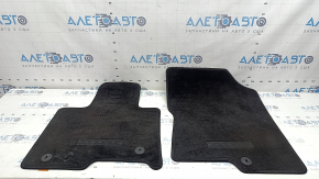 Set of Kia Sorento 21-26 black fabric floor mats, needs cleaning, driver's side mat is worn