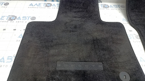 Set of Kia Sorento 21-26 black fabric floor mats, needs cleaning, driver's side mat is worn