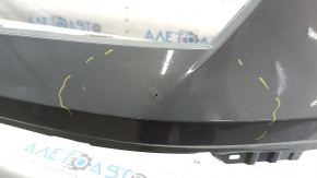 Bare front bumper for a 2023-2026 Honda Accord without parking sensors, gray, with chips and scratches.
