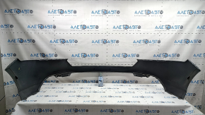 Bare front bumper for a 2023-2026 Honda Accord without parking sensors, gray, with chips and scratches.