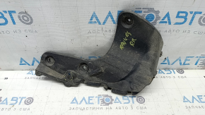 The right rear bumper liner of a Toyota Rav4 19-25 has a torn fastener.