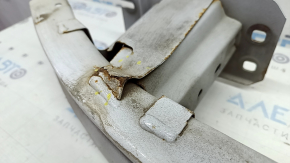 Lincoln MKZ 13-20 rear bumper reinforcement is pinned and rusty.
