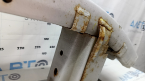 Lincoln MKZ 13-20 rear bumper reinforcement is pinned and rusty.