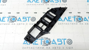 The front left window lift control panel for a Toyota Rav4 19-25 has a broken mount.