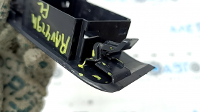 The front left window lift control panel for a Toyota Rav4 19-25 has a broken mount.